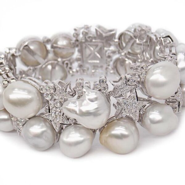 B002 – Μπλε Τοπάζ 15,50Ct – Ζαφείρια 0,48Ct – Μαργαριτάρι Νοτίων Θαλασσών 13,50mm